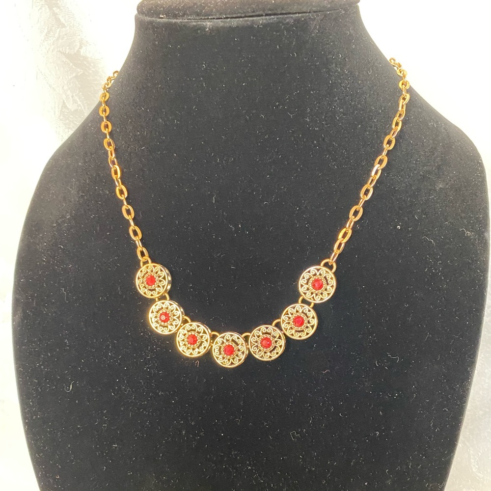 Gold and “garnet” necklace w/adjustable clasp. Good condition